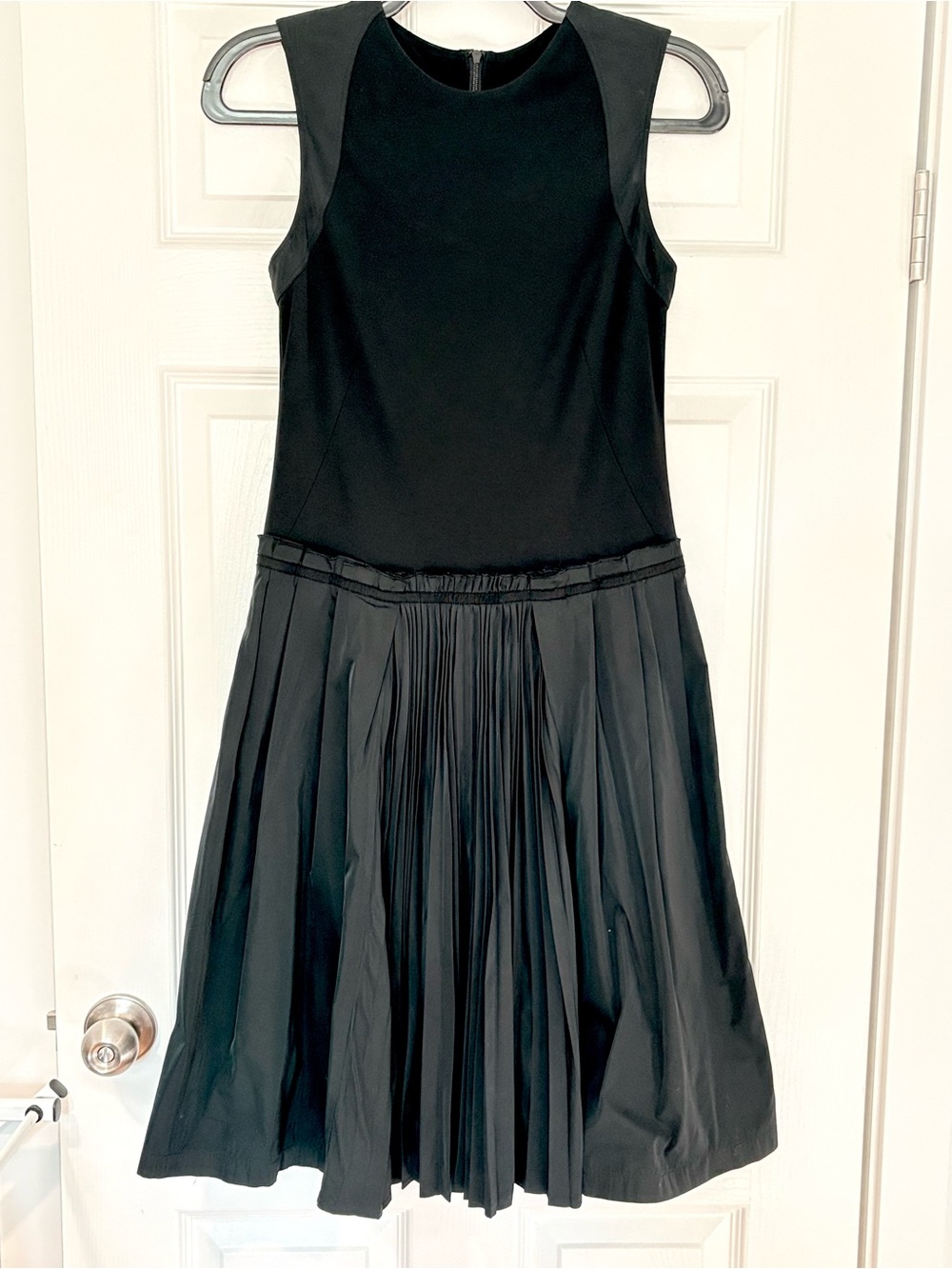 Sleeveless Black Midi Dress with Pleated Skirt